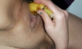 Redhead slut squirts all over a banana % 28first time% 29