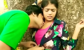 Charming giving a kiss Indian college girl outdoor romance