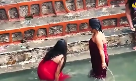 INDIAN WOMEN SHOW HER BUMB Increased by BRA IN RIVER