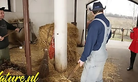 Hairy horse tamer double penetrated in horse stable for her first time