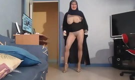 Veiled Muslim woman with big tits