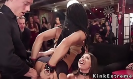 Ebony and brunette submitting at bdsm party